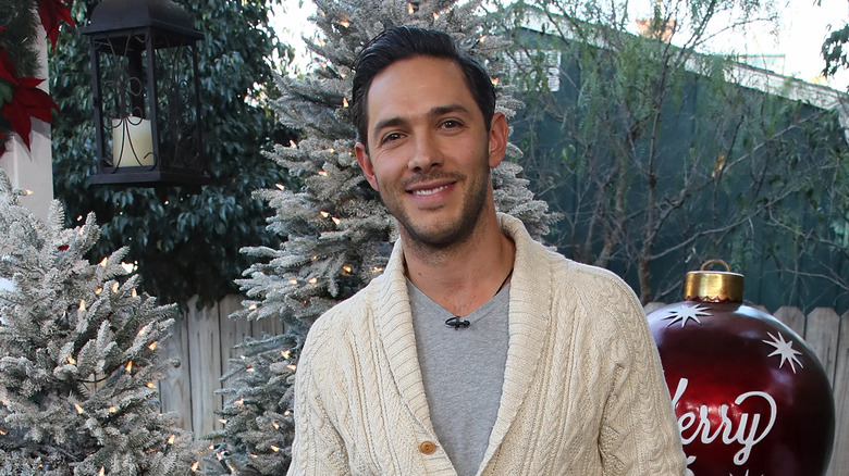 Michael Rady with Christmas trees