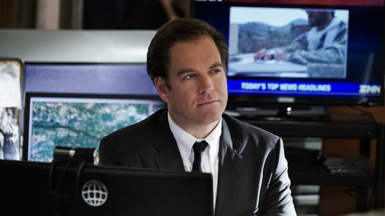 Michael Weatherly sitting at computer