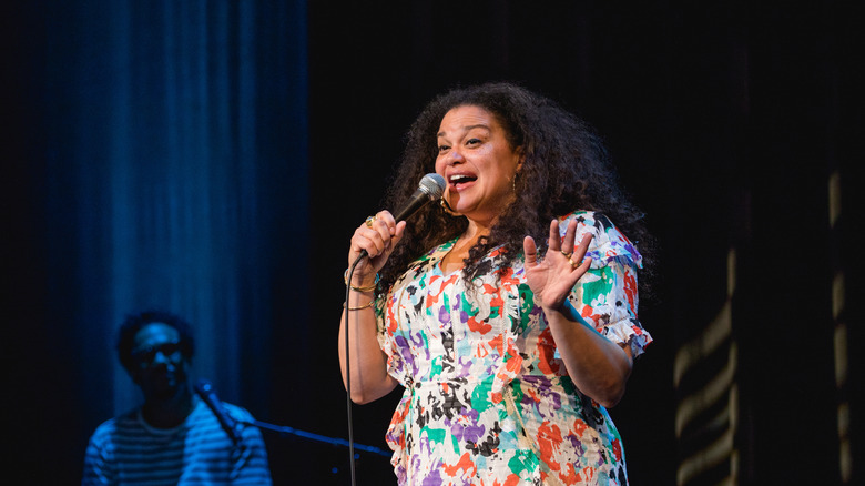 Michelle Buteau performing a comedy show