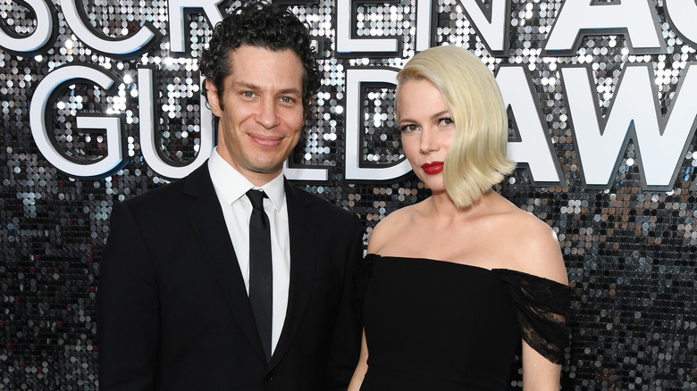 Michelle Williams and Thomas Kail pose 