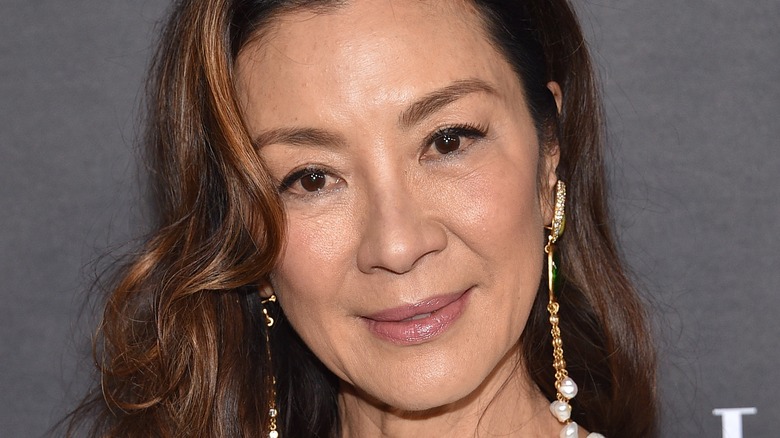 Michelle Yeoh poses at an Elle Women event 