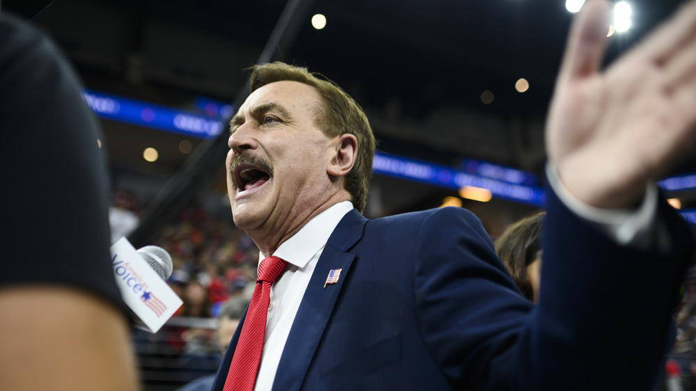 Mike Lindell gesticulating at a Trump rally