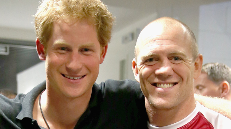 Prince Harry and Mike Tindall smiling