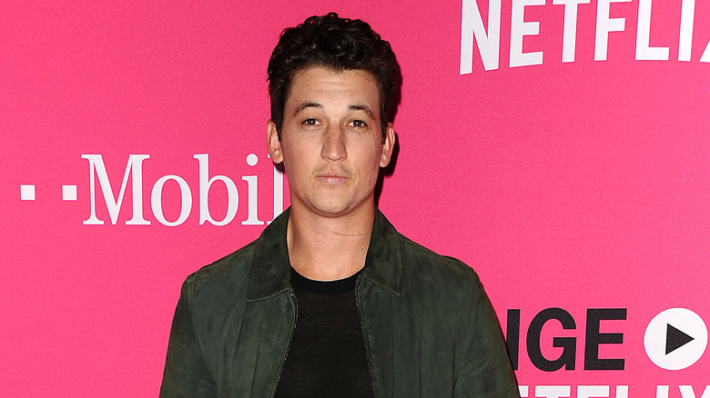 Miles Teller gray suede jacket