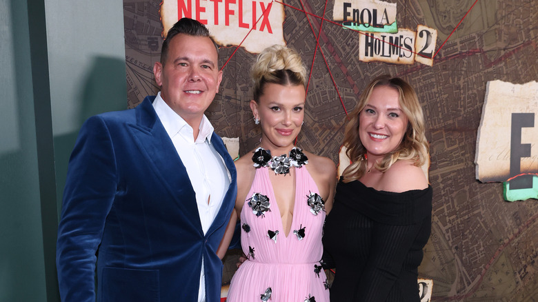 Millie Bobby Brown poses with her dad and sister 