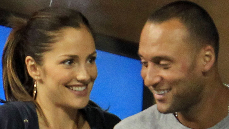 Minka Kelly and Derek Jeter at a ballgame