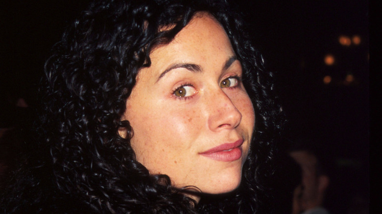 Minnie Driver, smirking