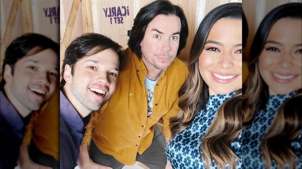 Nathan Kress, Jerry Trainor, and Miranda Cosgrove smiling