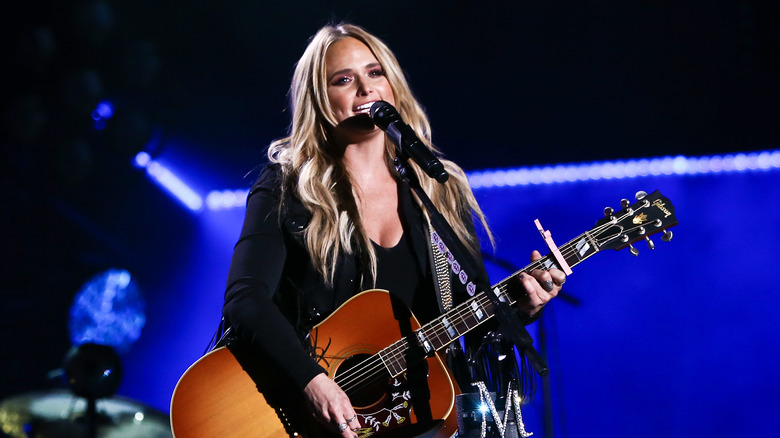 Miranda Lambert on stage with a guitar