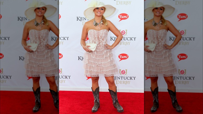 Miranda Lambert wearing boots and dress