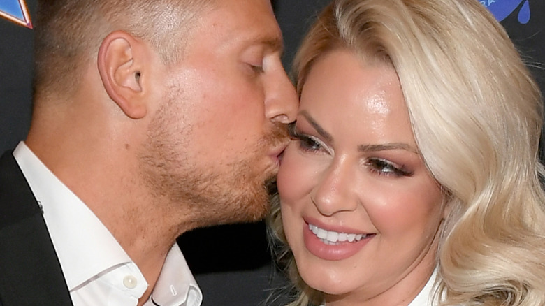 Mike 'Miz' Mizanin kissing Maryse "Mrs" Mizanin