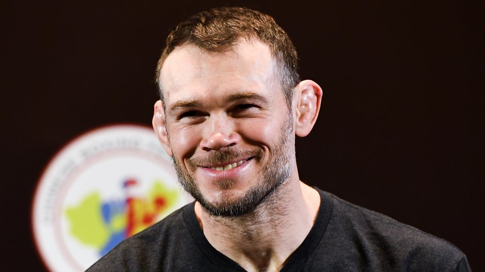 Forrest Griffin in a black t-shirt, smilin