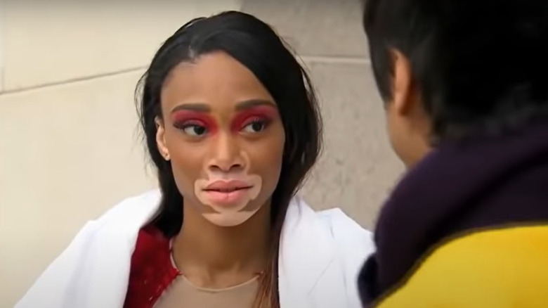 Winnie Harlow looking at Yu Tsai