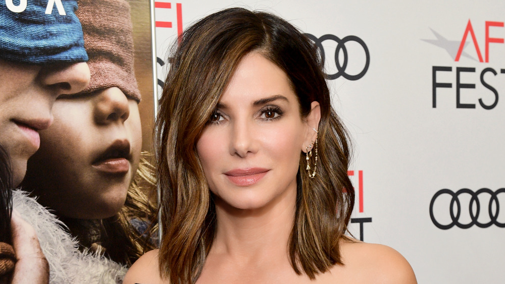 Sandra Bullock smiling on the red carpet