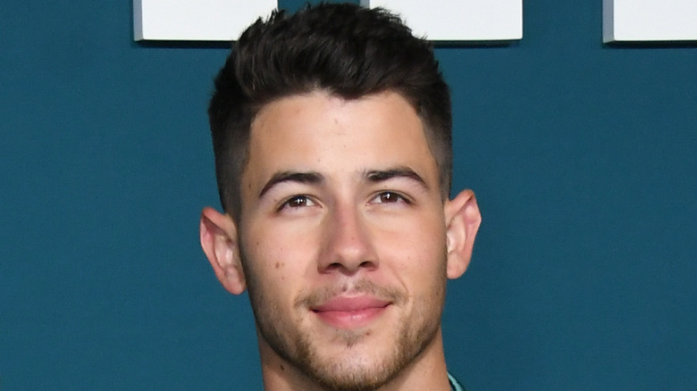Nick Jonas smiling