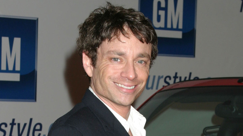 Chris Kattan at an event, smiling