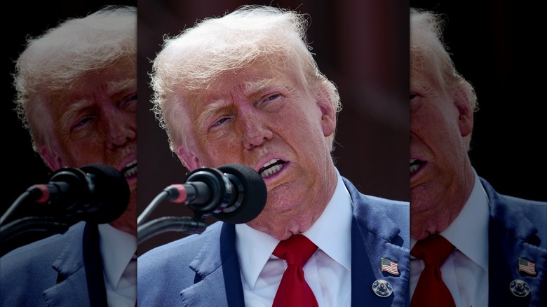 Donald Trump sweating behind microphone