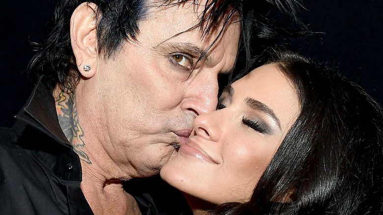 Tommy Lee kissing Brittany Furlan