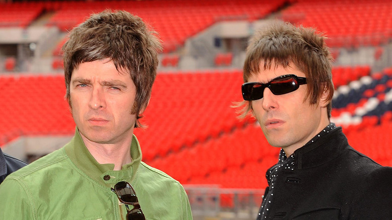 Serious-looking Noel Gallagher, Liam Gallagher