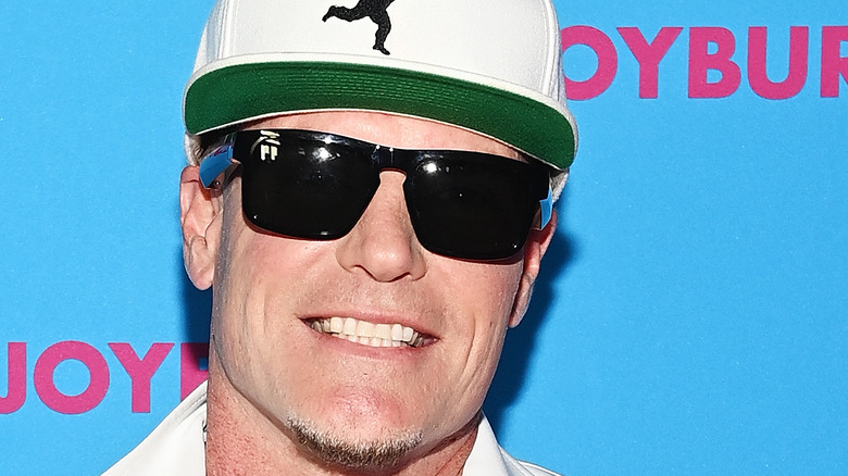 Vanilla Ice wearing sunglasses and hat