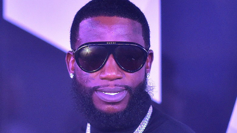 Gucci Mane wearing dark shades