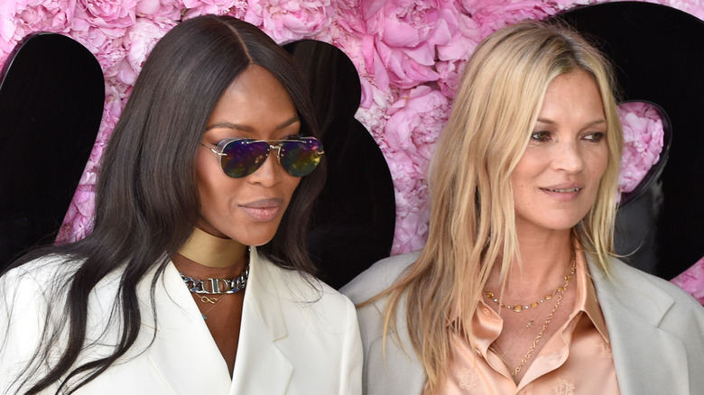 Naomi Campbell and Kate Moss at an event