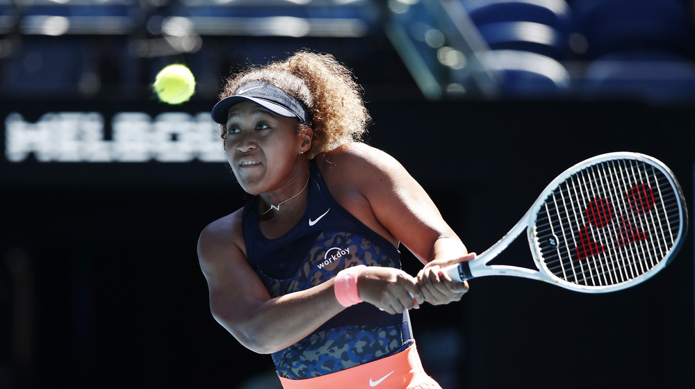 Naomi Osaka playing tennis