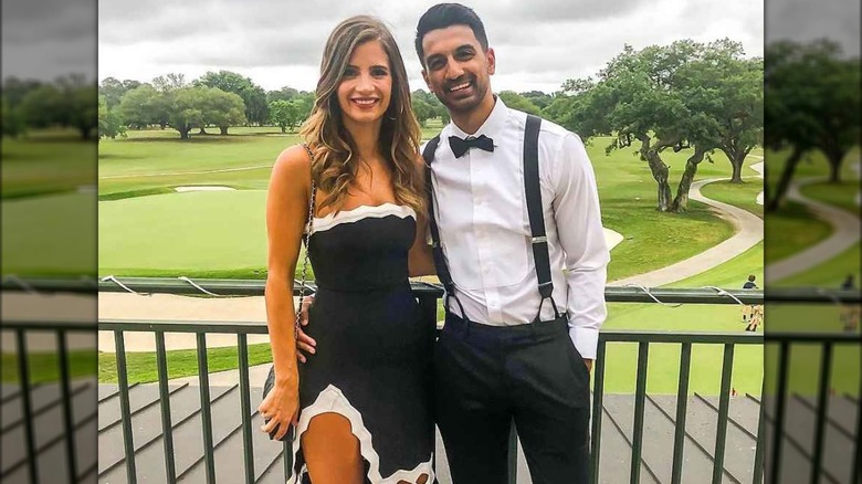 Naomie Olindo and Metul Shah in black-and-white outfits