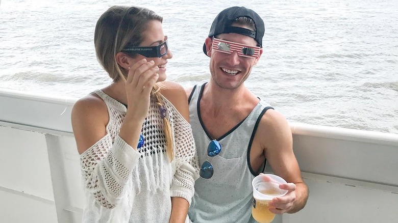 Naomie Olindo and Craig Conover on a boat