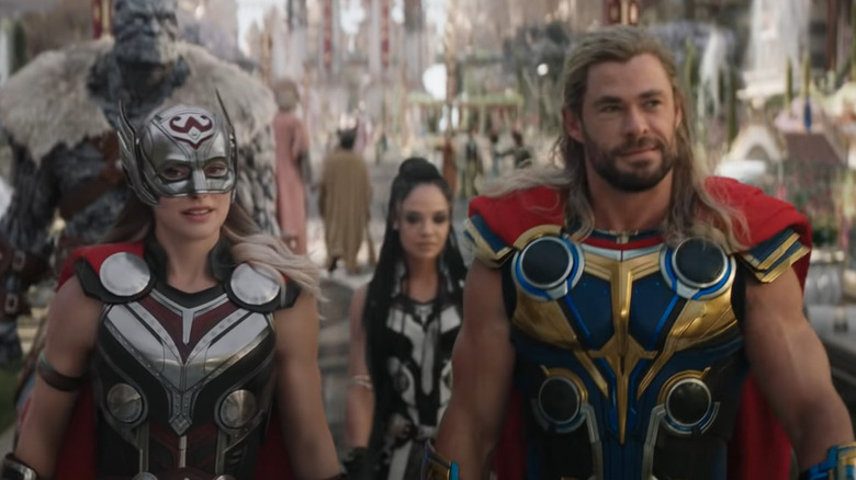 Natalie Portman, Chris Hemsworth in Thor costumes