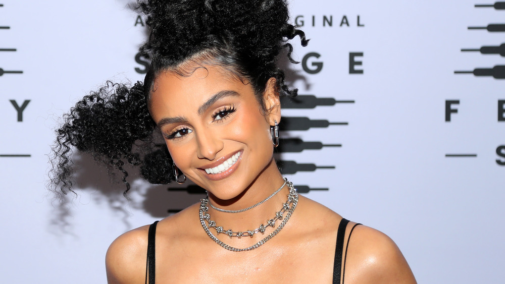 Nazanin Mandi stylish hair and smiling