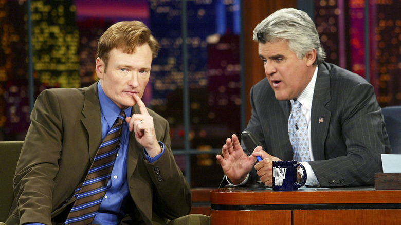 Conan O'Brien being interviewed by Jay Leno