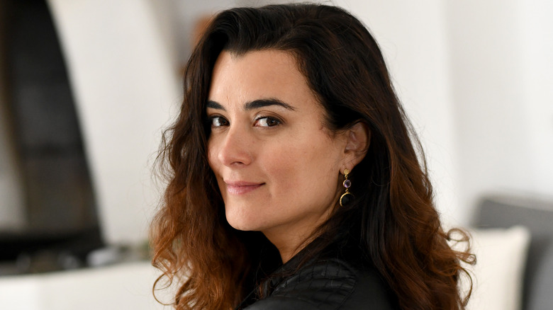 Cote de Pablo smiles for a photoshoot