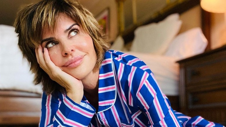 Lisa Rinna resting head on hand