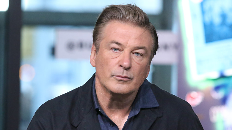 ctor Alec Baldwin watches the Men's Singles final match 