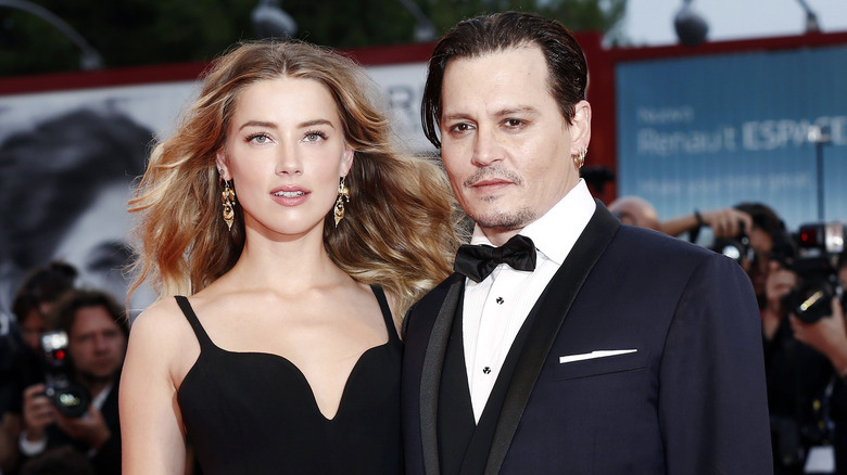 Amber Heard and Johnny Depp pose together