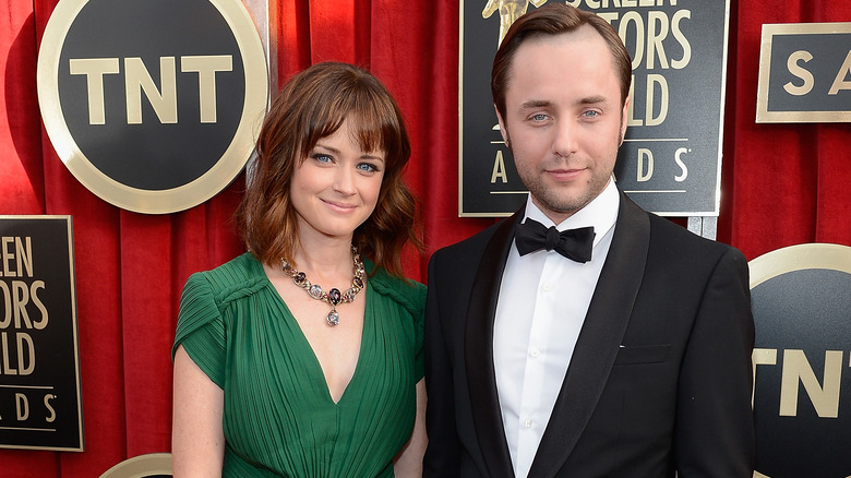 Alexis Bledel and Vincent Kartheiser posing