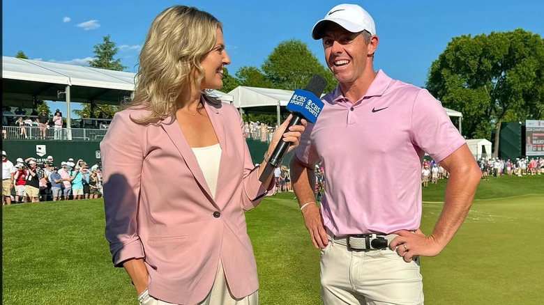 Amanda Balionis and Rory McIlroy wearing pink