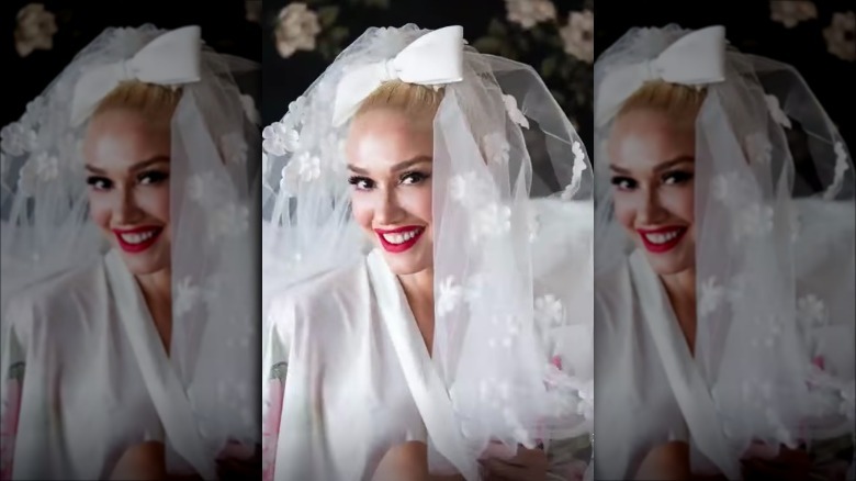 Gwen Stefani posing in a bridal veil