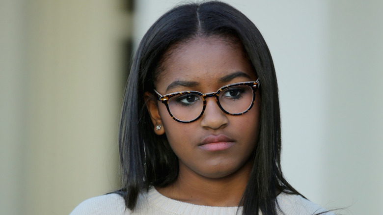 Sasha Obama wearing glasses