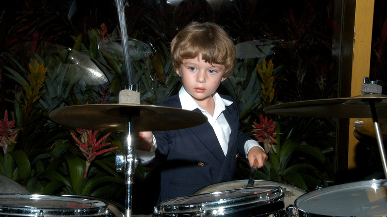 Barron Trump playing drums as a child