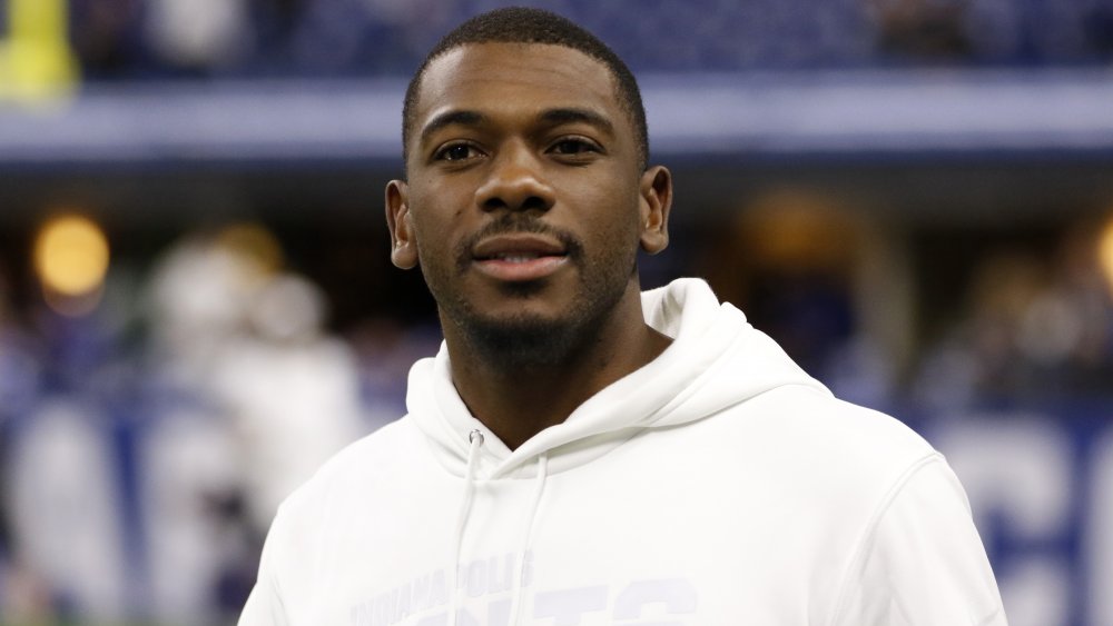 NFL star Devin Funchess wearing a white hoodie 