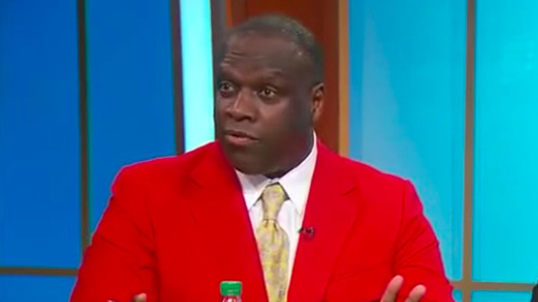 Dexter Manley in red blazer