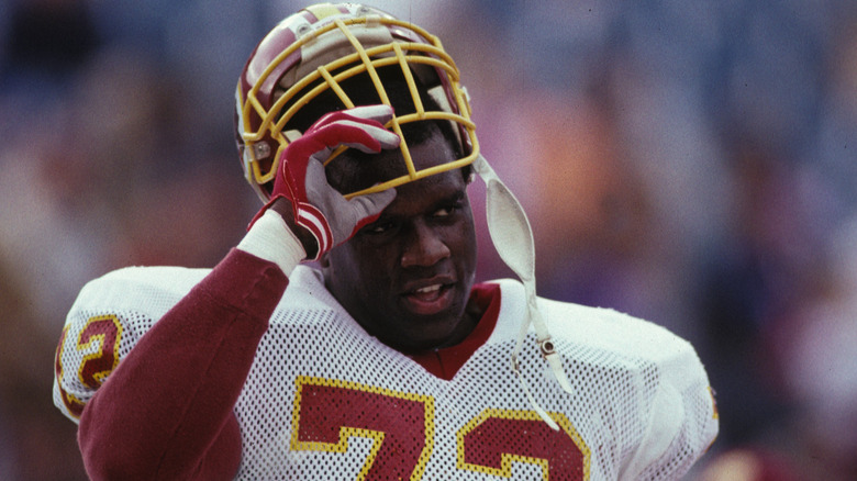 Dexter Manley taking off helmet