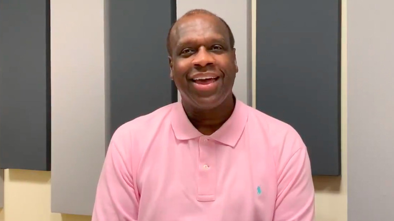 Dexter Manley in pink shirt