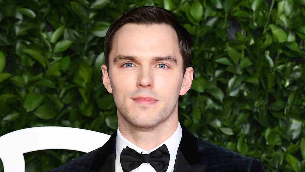 Nicholas Hoult posing on the red carpet