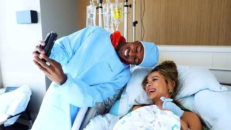 Nick Cannon and Alyssa Scott with newborn