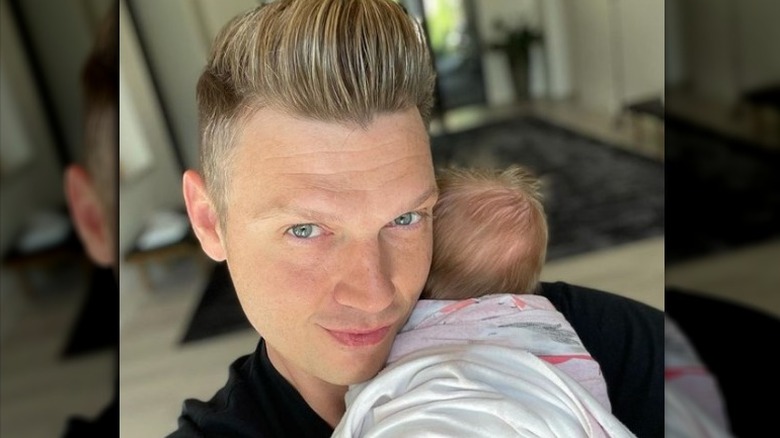 Nick Carter holding daughter Pearl in selfie