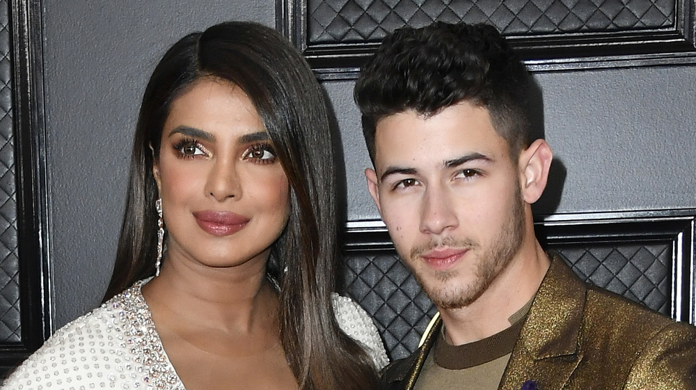 Priyanka Chopra and Nick Jonas posing on the red carpet