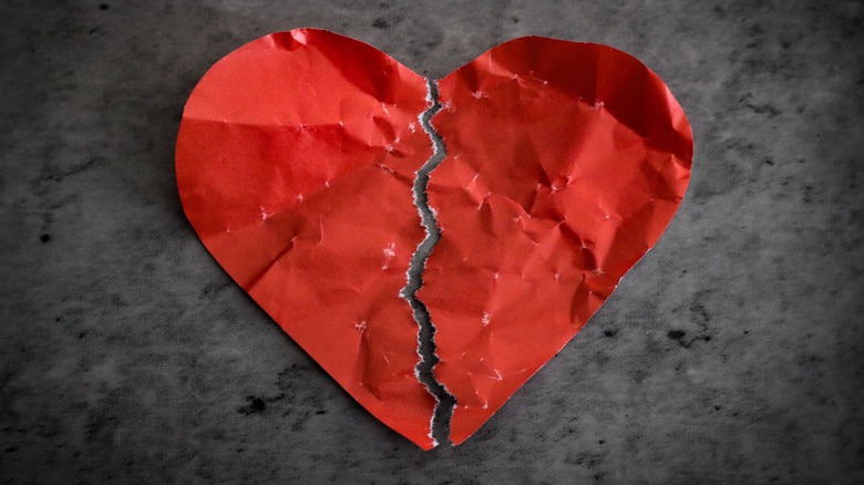 Broken heart made of crumpled paper